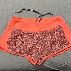 Nike coral and black running shorts size medium!